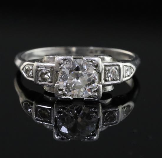 A 1930s/1940s platinum and single stone diamond ring, with diamond set shoulders size K.